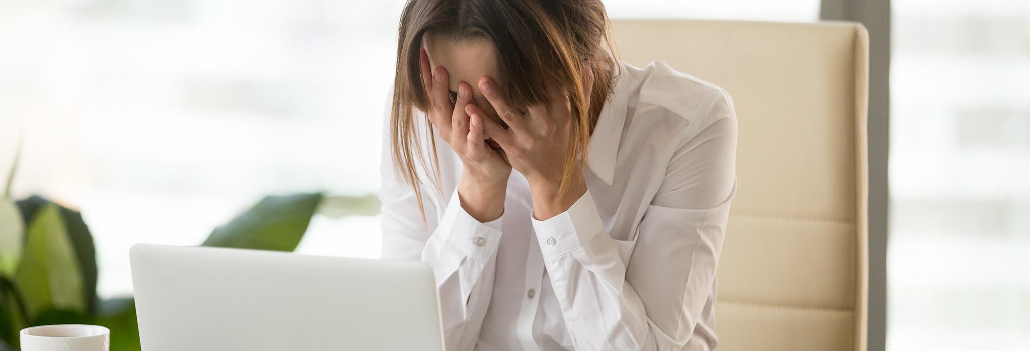 06042022 Mental health girl holding head in hands Mental health girl holding head in hands